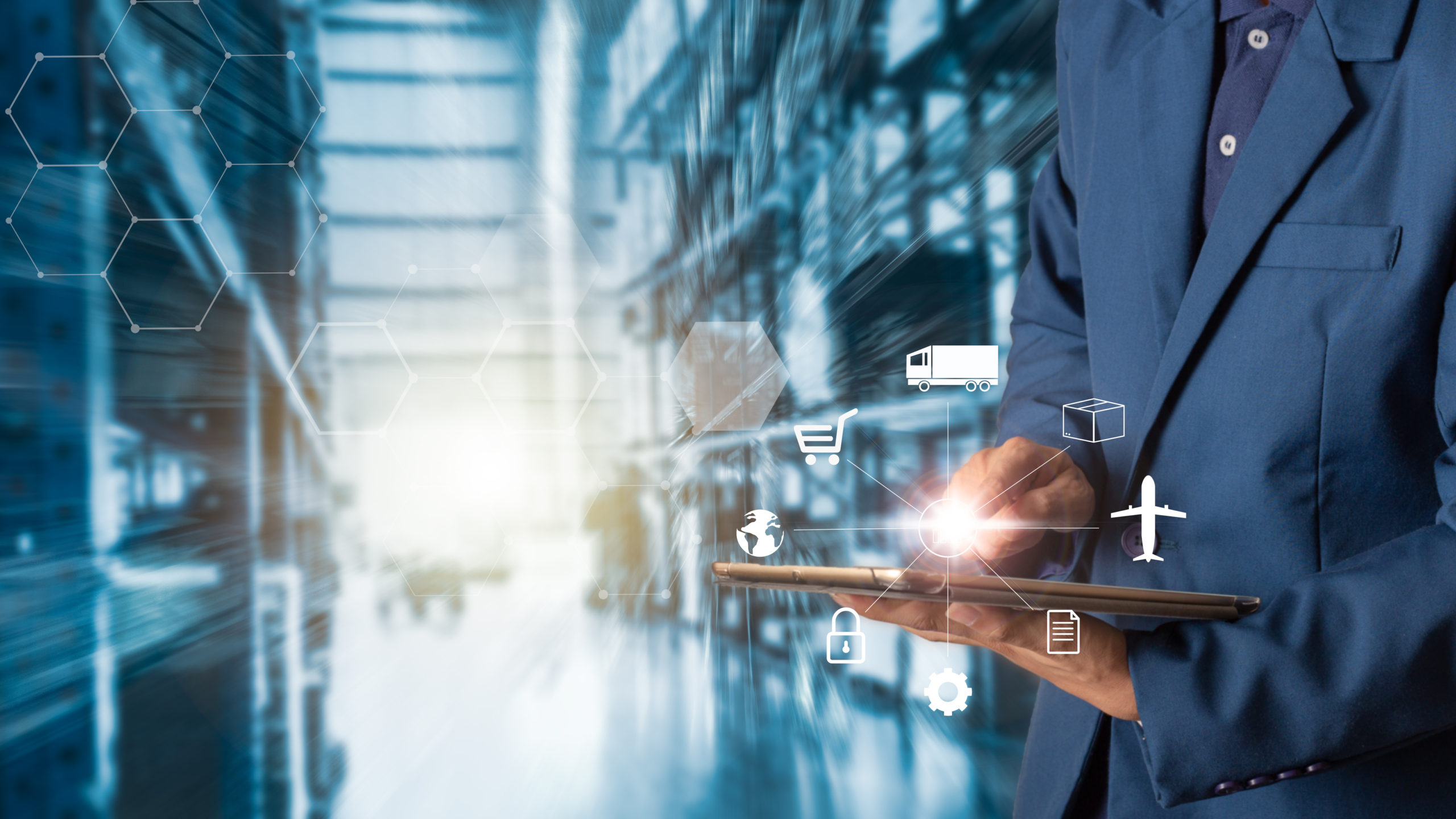Business Logistics concept, Businessman manager using tablet check and control for workers with Modern Trade warehouse logistics. Industry 4.0 concept